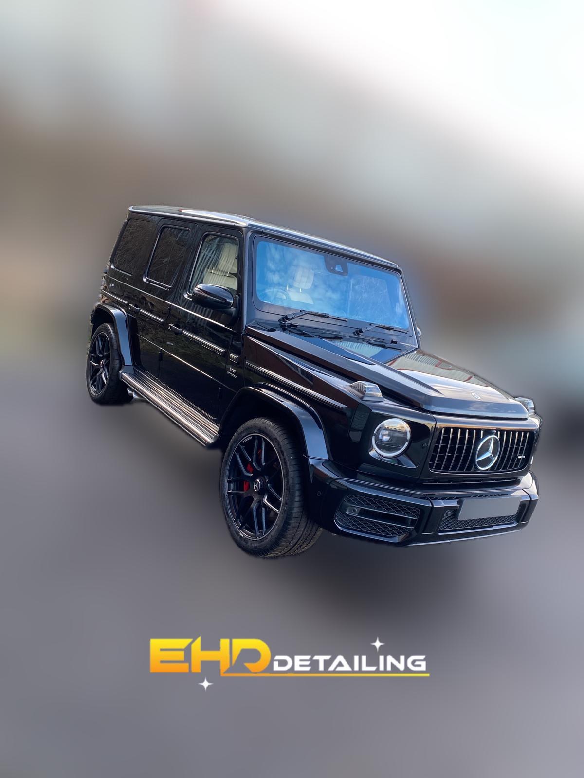 Mercedes G‑Wagen with deep black, high‑gloss paint